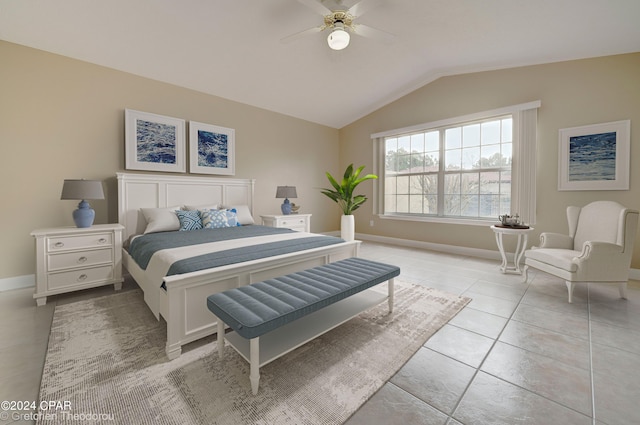 tiled bedroom featuring vaulted ceiling and ceiling fan