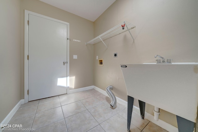 laundry area featuring light tile floors, hookup for an electric dryer, and washer hookup