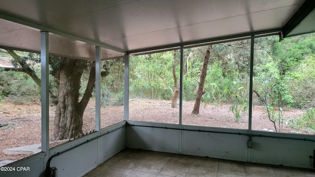 unfurnished sunroom with a healthy amount of sunlight