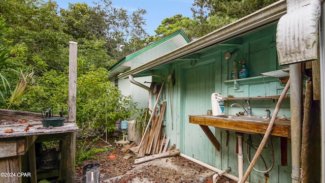 view of side of property with sink