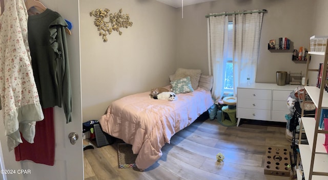 bedroom featuring light wood-type flooring