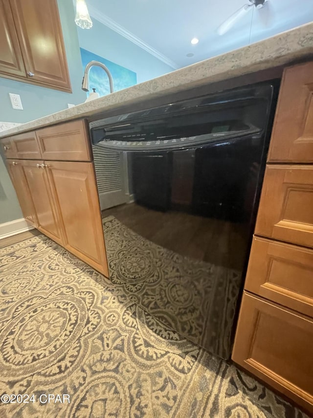 room details featuring baseboards, ornamental molding, and light countertops