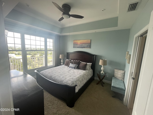 bedroom with baseboards, visible vents, ceiling fan, crown molding, and carpet floors