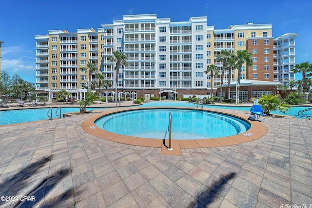 pool with a patio