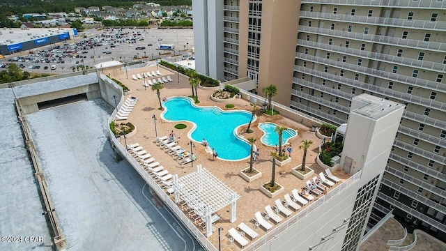 view of swimming pool with a patio area