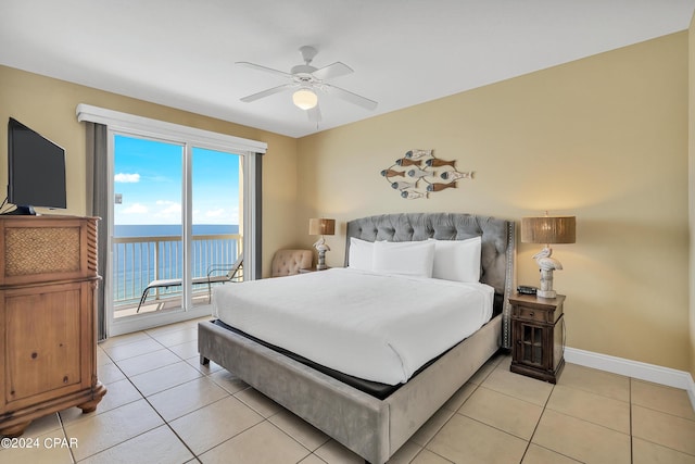 bedroom featuring a water view, ceiling fan, access to exterior, and light tile patterned flooring