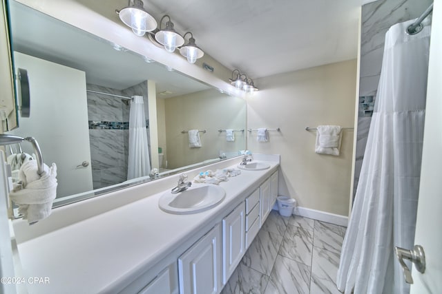 bathroom with a shower with shower curtain and vanity