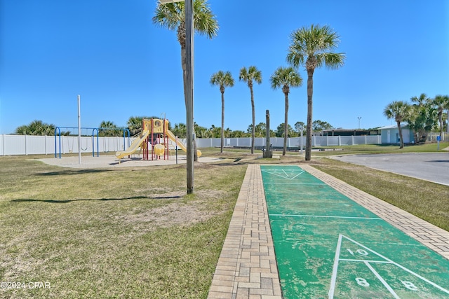 view of play area with a yard