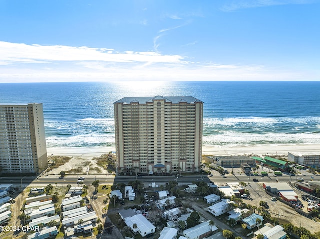 bird's eye view with a view of the beach and a water view