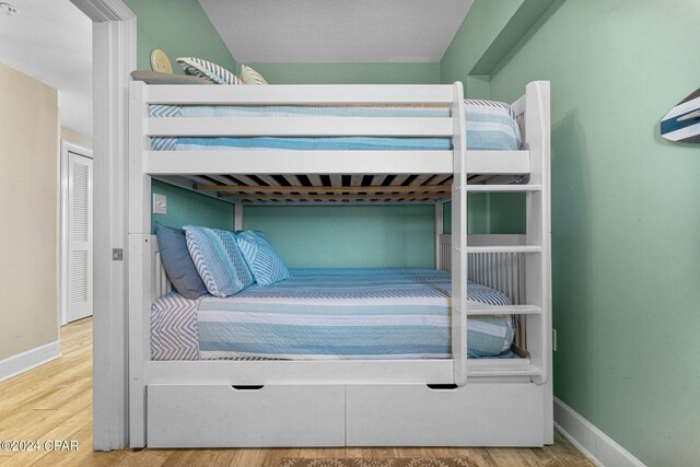 bedroom with light wood-type flooring