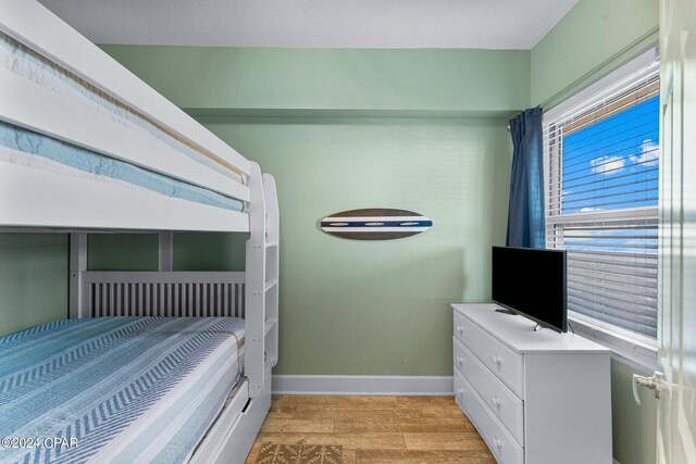 bedroom featuring light wood-type flooring