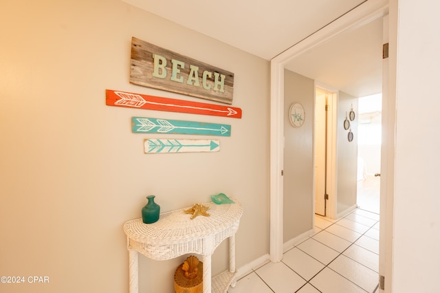 hallway with tile floors