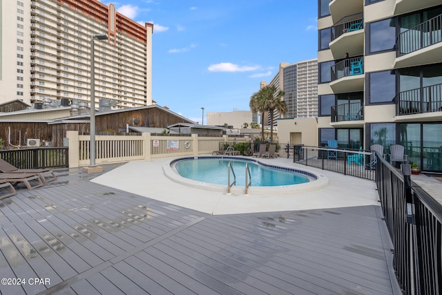 view of pool featuring a deck