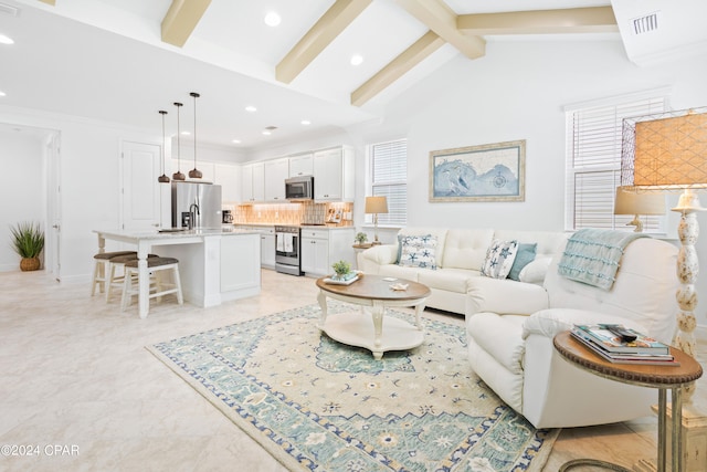 living room with high vaulted ceiling, beamed ceiling, and light tile patterned floors