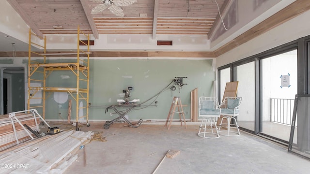 interior space featuring concrete flooring and wood ceiling