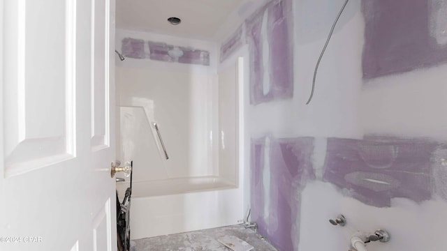 bathroom featuring  shower combination