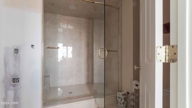 bathroom with an enclosed shower