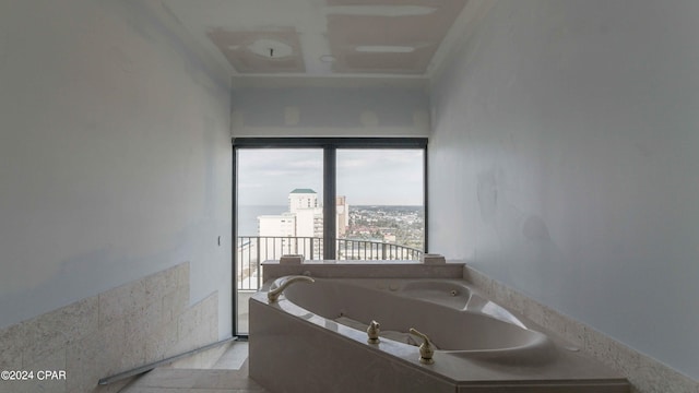 bathroom featuring tiled bath