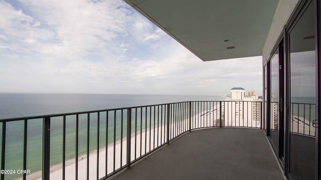 balcony featuring a water view