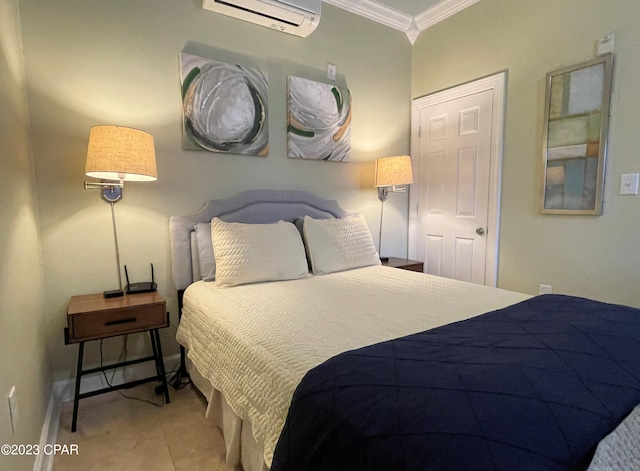 bedroom with a wall mounted AC, ornamental molding, ensuite bath, and light tile patterned floors