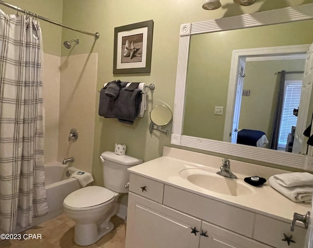 bathroom with vanity, toilet, tile patterned floors, and crown molding