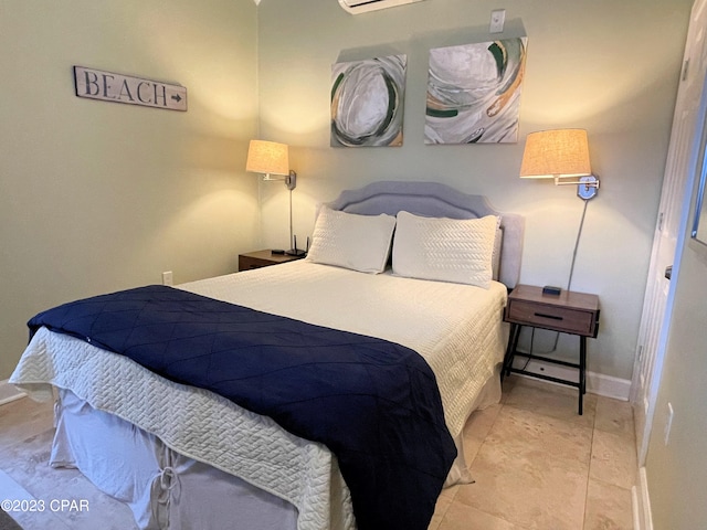 tiled bedroom with an AC wall unit and crown molding