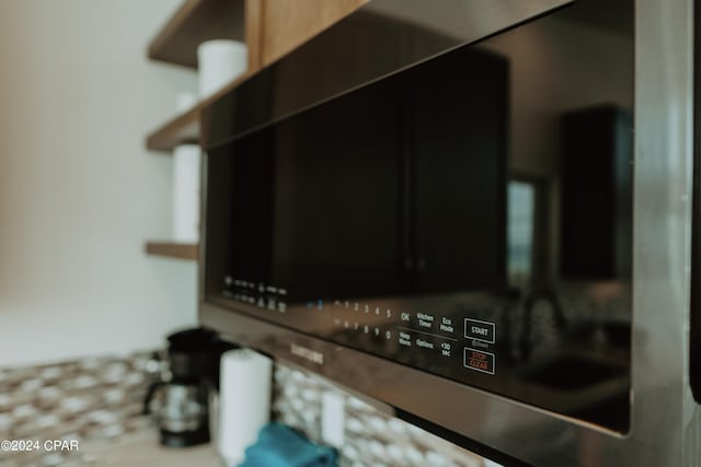 details featuring stainless steel microwave