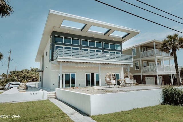 rear view of house featuring a patio