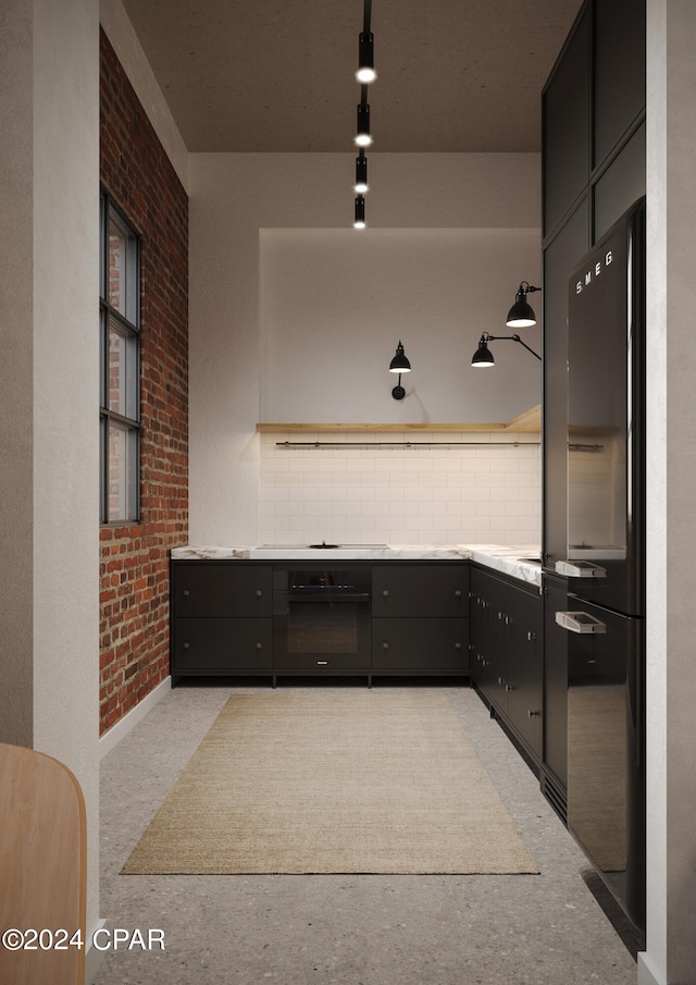 kitchen with brick wall