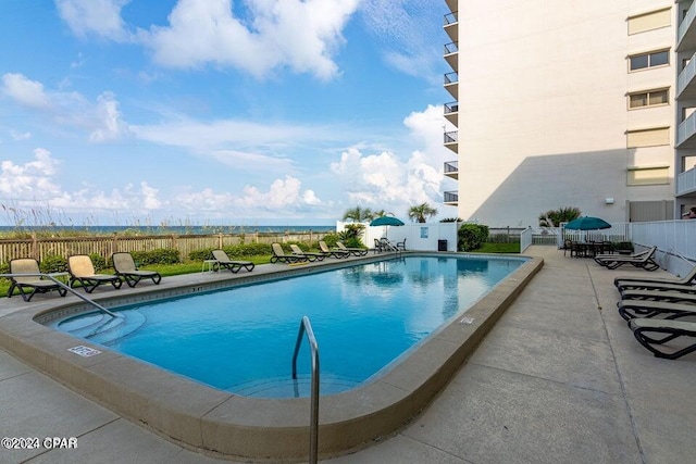 view of pool featuring a patio area