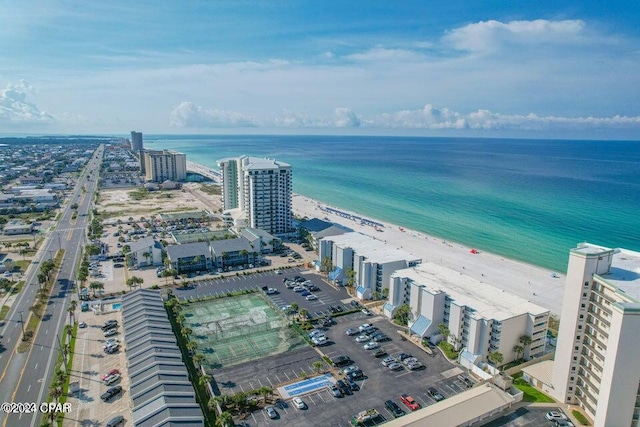 drone / aerial view featuring a view of the beach and a water view