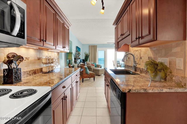 kitchen featuring backsplash, electric stove, sink, light tile floors, and dishwasher