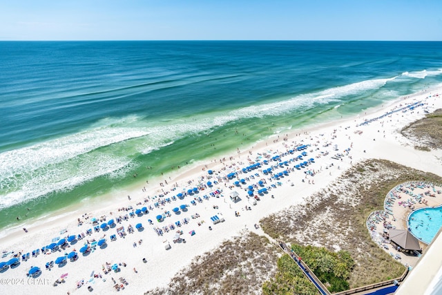 bird's eye view with a view of the beach and a water view