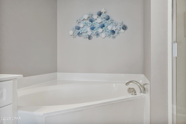 bathroom with a garden tub