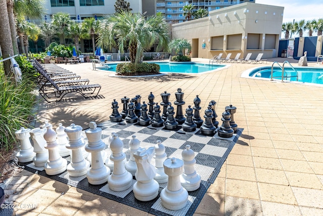 pool featuring a patio area