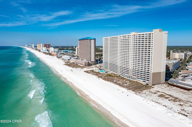 drone / aerial view with a view of city, a beach view, and a water view