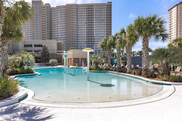 community pool with a view of city