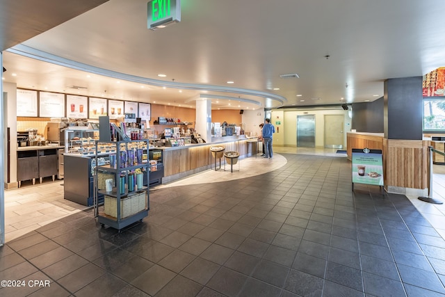 building lobby featuring visible vents