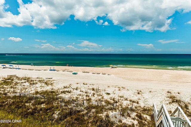 property view of water featuring a beach view