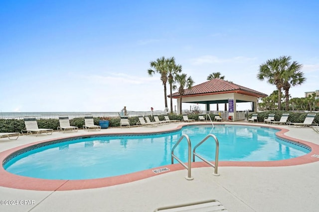 view of swimming pool with a patio area and a gazebo