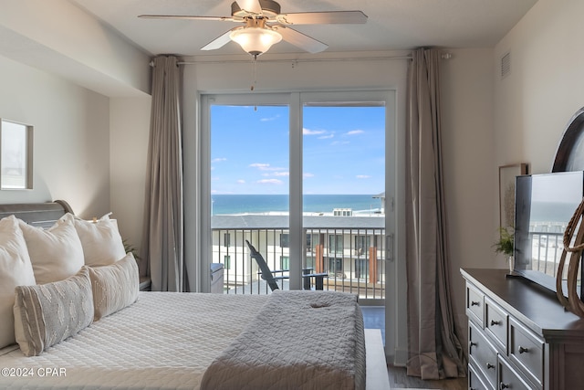 bedroom featuring ceiling fan, access to outside, and wood-type flooring