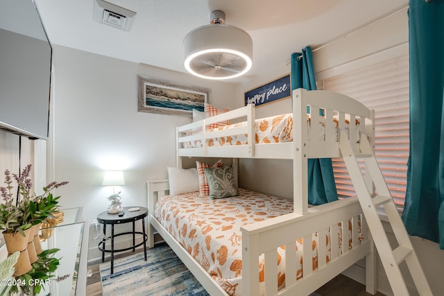 bedroom featuring wood-type flooring