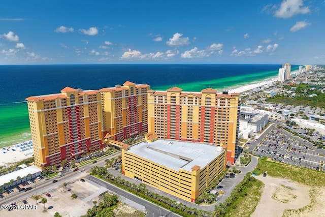 aerial view featuring a water view and a view of the beach