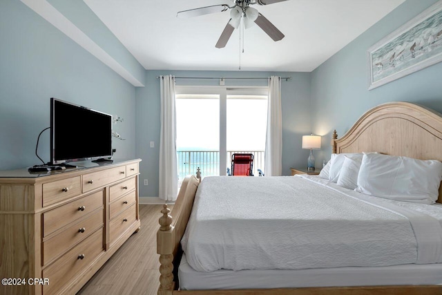 bedroom featuring ceiling fan, access to exterior, and light hardwood / wood-style floors