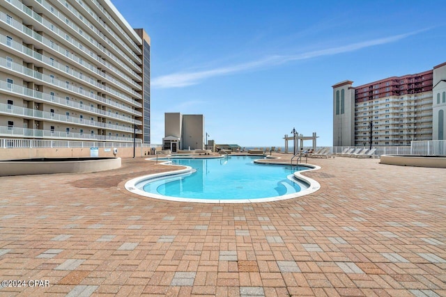 view of pool with a patio area