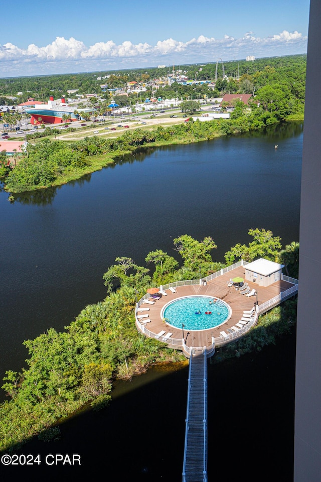 birds eye view of property with a water view