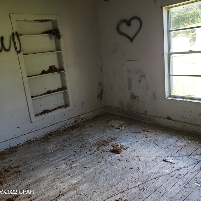 spare room featuring hardwood / wood-style flooring