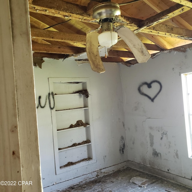 interior details featuring ceiling fan