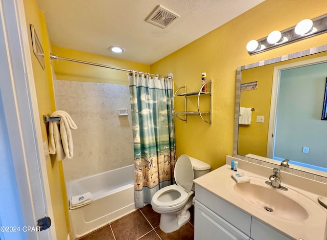 full bathroom with toilet, a textured ceiling, vanity, shower / bath combination with curtain, and tile floors