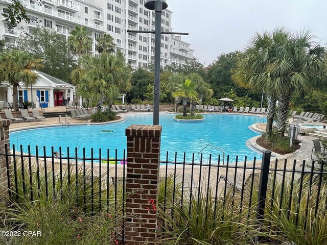 view of swimming pool with a patio